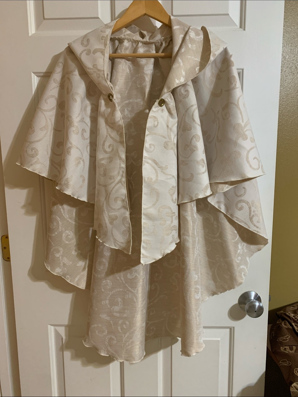 Cream scroll work hooded capelet